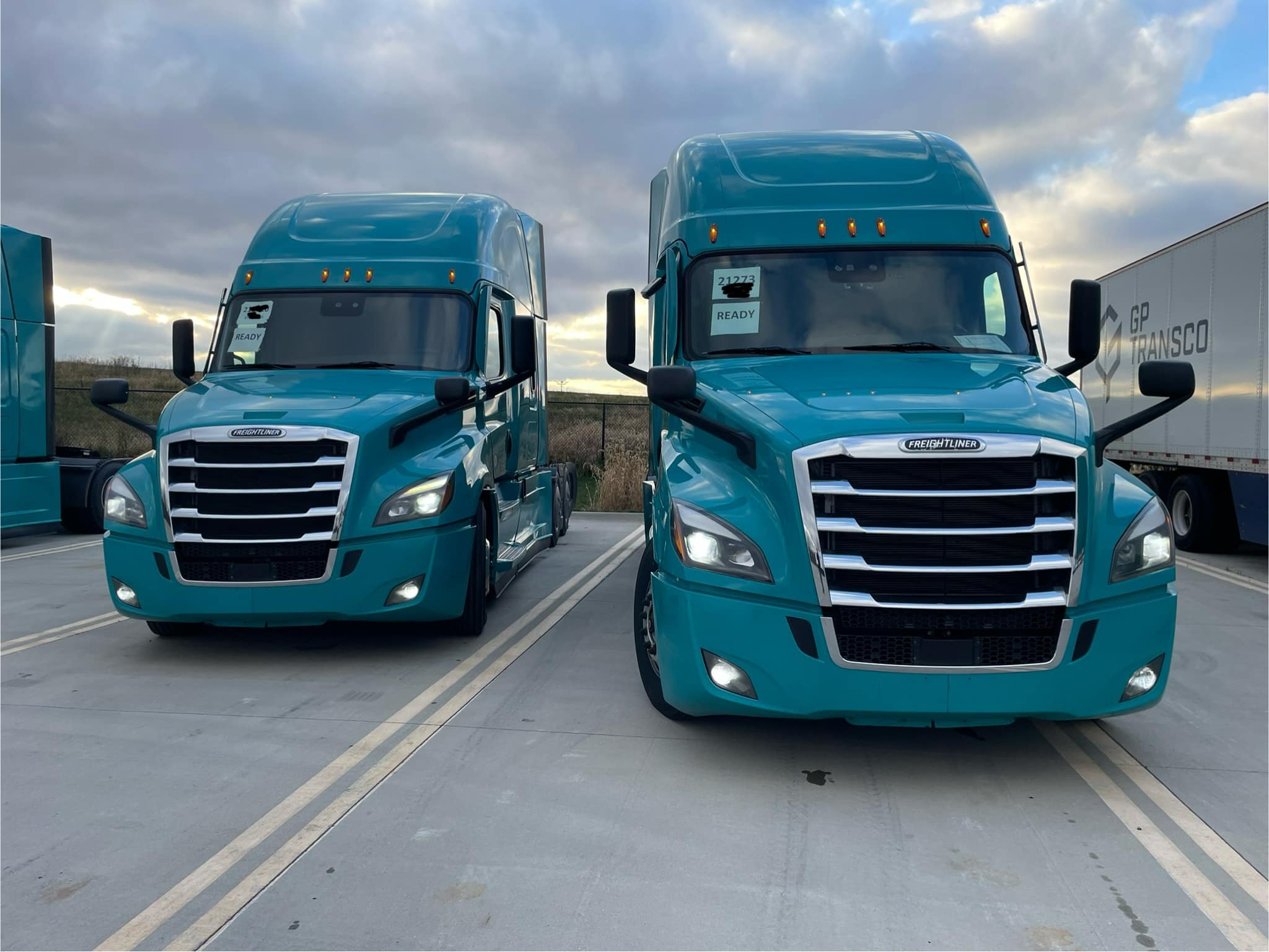 TVR Logistics Inc flatbed truck fleet on the highway